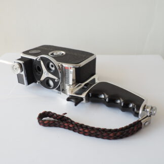 Bolex D8L + grip + polsriem